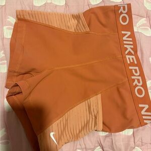 Nike Women's Athletic Shorts in Orange
